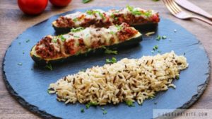 stuffed, zucchini, tomato, wild rice, lovethatbite, recipe, summer, squash, tasty, delicious, plate, fork, knife, scrumptious, easy