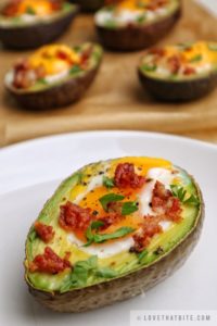 baked, avocado, egg, boats, parsley, bacon bits, yolk, egg-cellent, yummy, delicious, recipe, breakfast, brunch